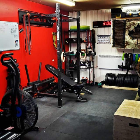 Home workout space with power rack in a Canadian garage