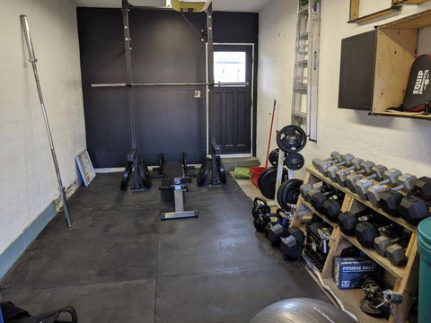 Strength training home gym setup in a Canadian garage