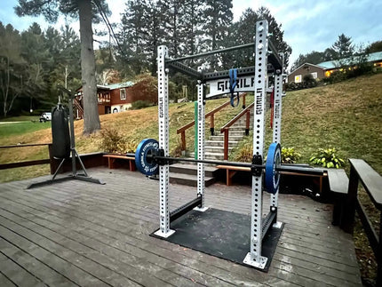 Home gym setup in a US garage with strength equipment