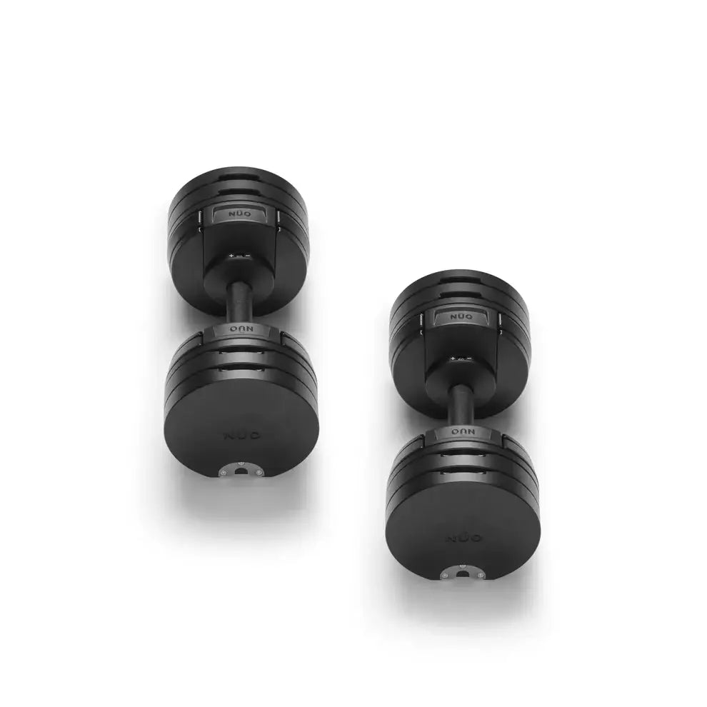 Pair of matte black Nuobell adjustable dumbbells on a white background