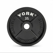 York Olympic Standard 35LB cast iron plate – durable black iron construction, ideal for powerlifting, strength training, and traditional barbell workouts