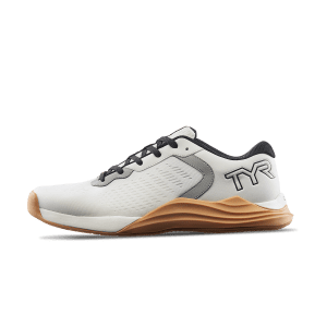 Exterior side view of the White/Gum TYR CXT-1 Trainer, displaying its sleek white design and TYR logo contrasted with a gum-colored sole, tailored for athletic performance.